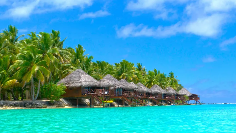 beautiful luxury overwater villas face the stunning turquoise ocean water