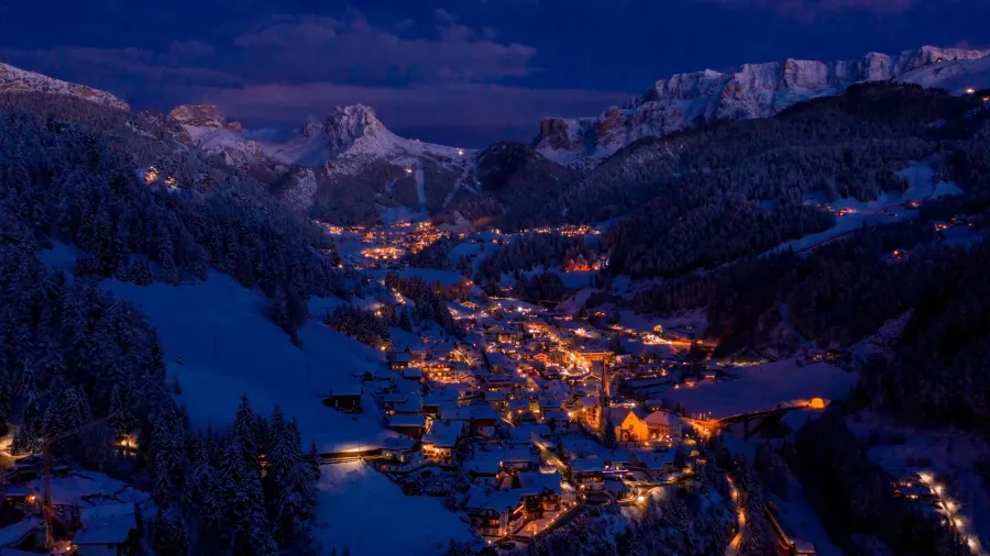 beautiful panoramic view of dolomites mountains at dusk during winter