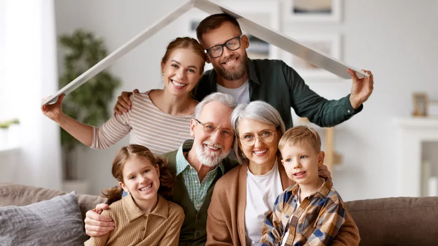big happy family grandparents mother father with little kids son