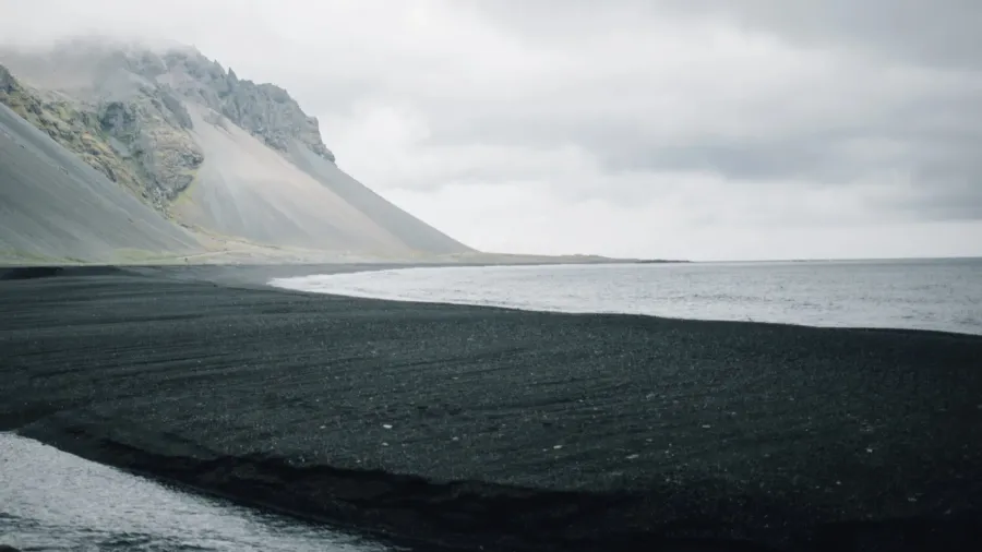 black volcanic sand beach landscape in iceland