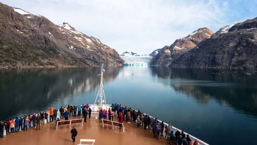 blue skies glaciers mountains and icebergs of prins christian sund