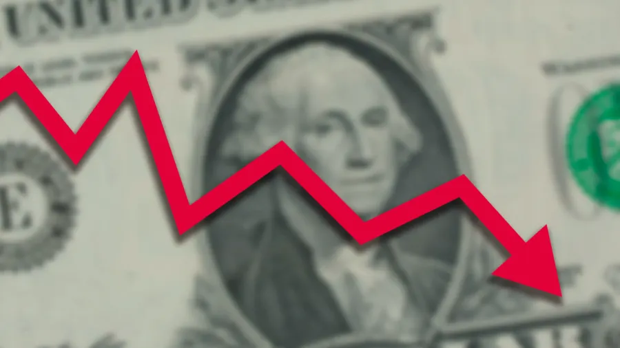 blurred one us dollar bill with red stock market chart