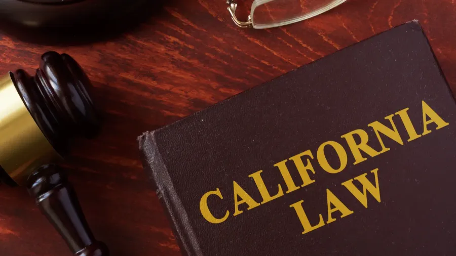 Law book titled "California Law" with a gavel