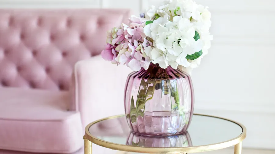 bouquet of pastel hydrangeas in glass vase flowers in a