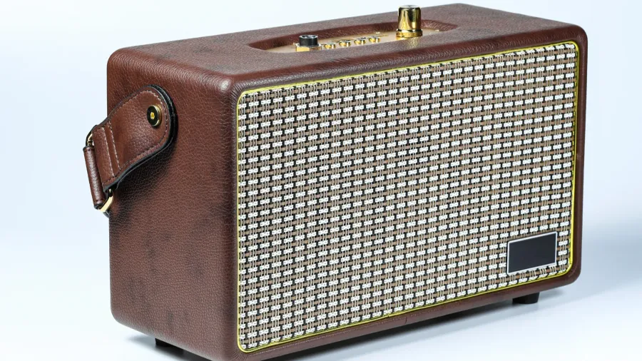 brown vintage style portable wireless speaker isolated on white background
