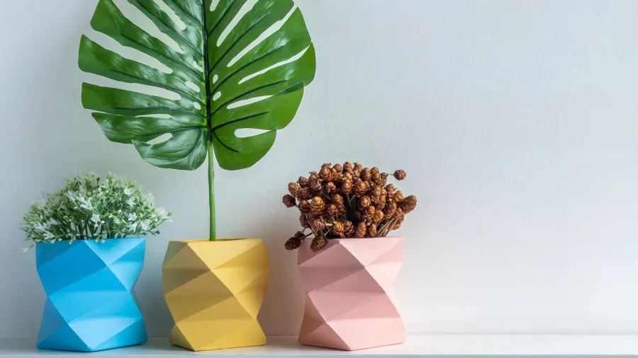 cactus pot concrete pot three empty blue pink and yellow