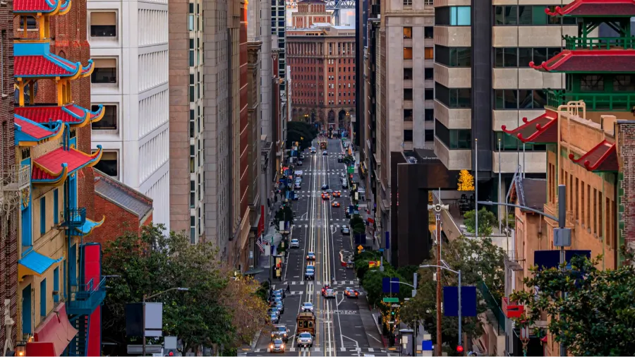 california street near china town with the bay bridge at