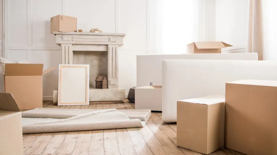 cardboard boxes in empty room