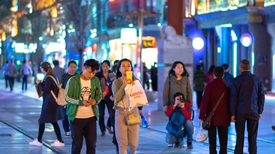 beijing  china  april 7 2016 people stroll along