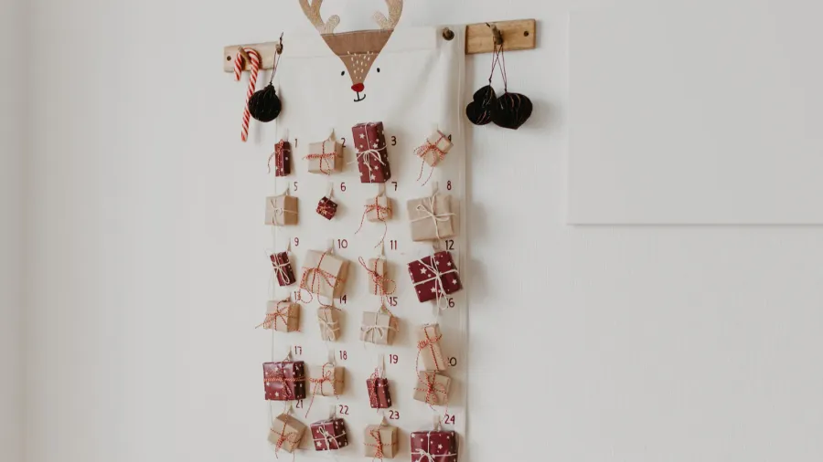 christmas advent calendar hanging on the wall wrapped gifts for