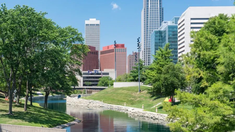 city skyline in downtown omaha nebraska along the gene leahy