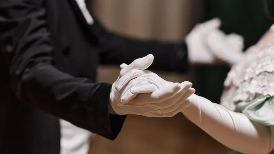 close up of historical young couple dancing waltz together in