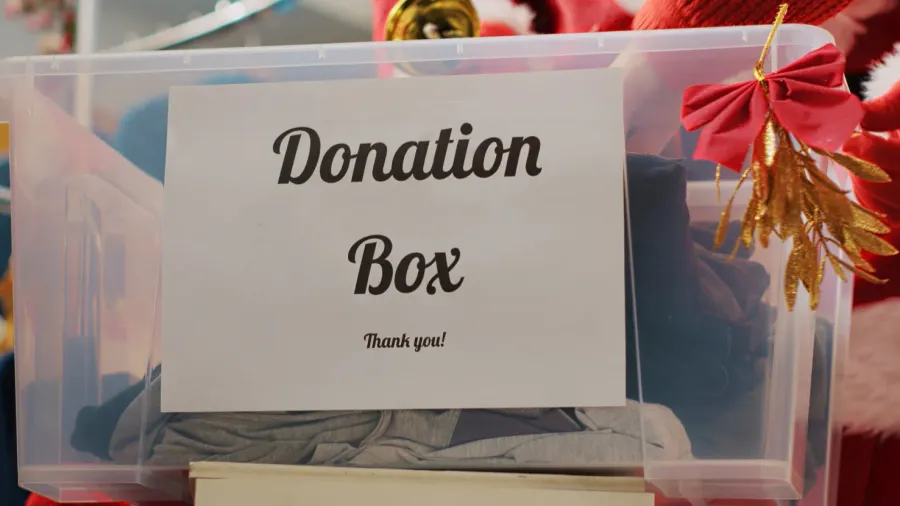 close up shot of donation box in fashion shop set