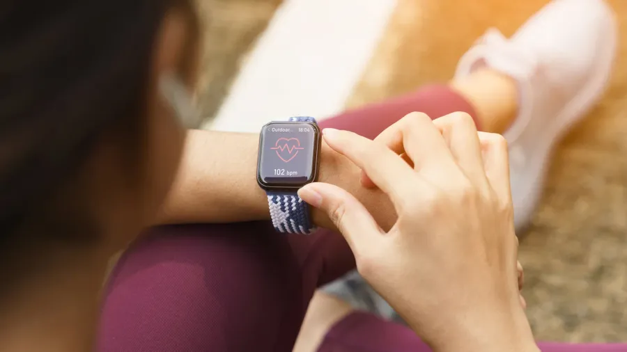 closeup sport women check on her smart watch