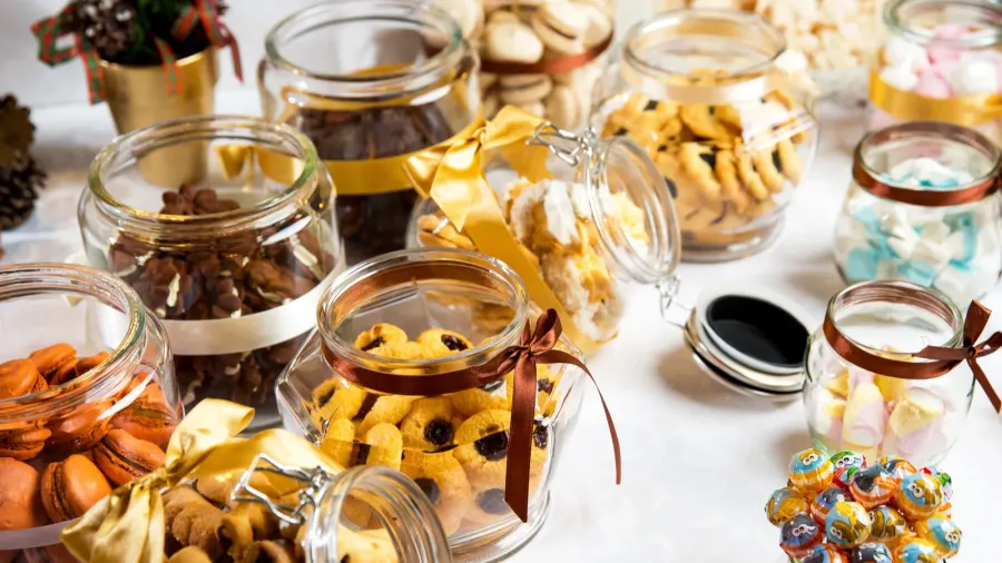 colorful cookies of various shapes on a beautifully decorated table