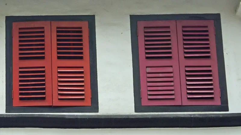 colorful old wooden window shutters in singapore