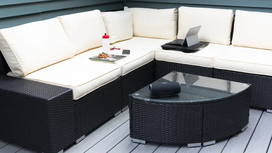 computer phone and usic set up on an outdoor deck