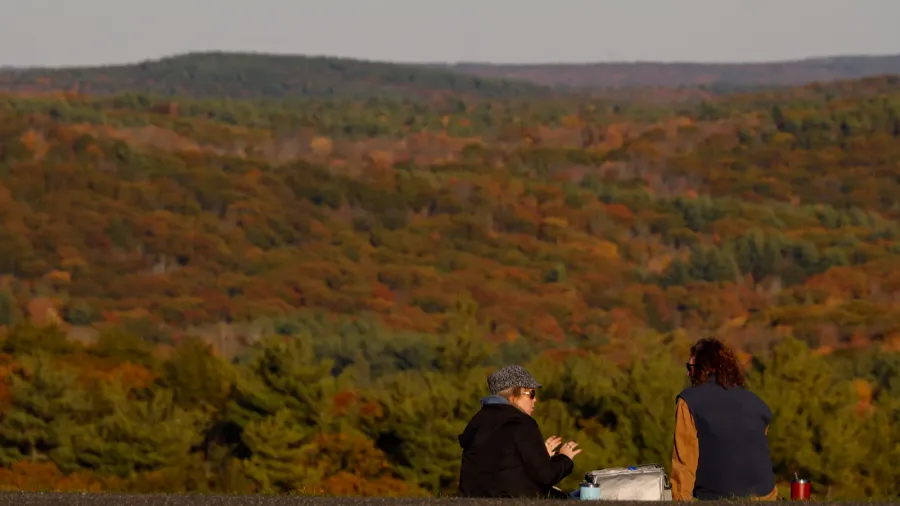 cornwall ct usa two people having a picnic with fall