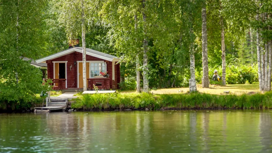cottage by the lake in rural finland