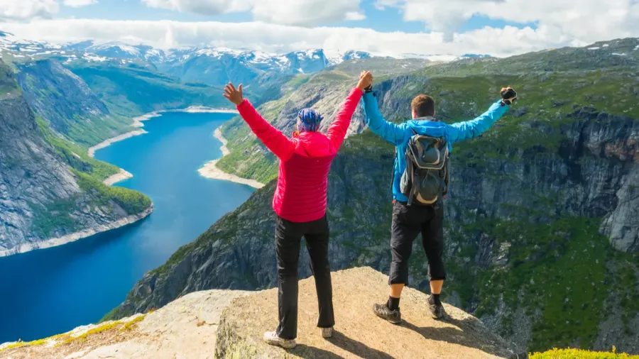 couple posing on trolltunga norway