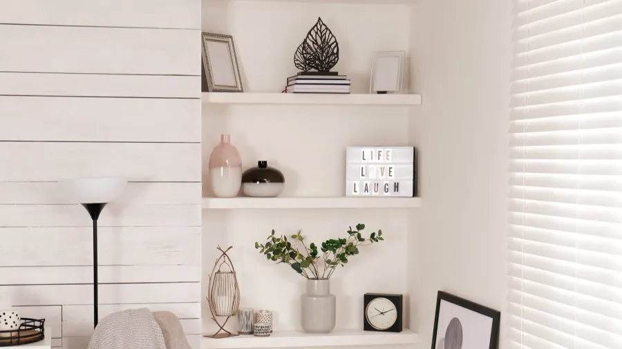 cozy room interior with stylish furniture wall shelves and beautiful