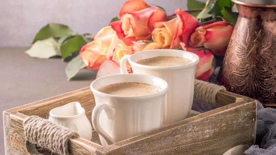 cup of coffee in vintage wooden tray