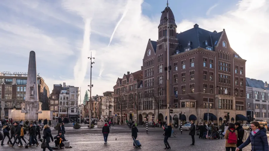 dam square amsterdam in the morning