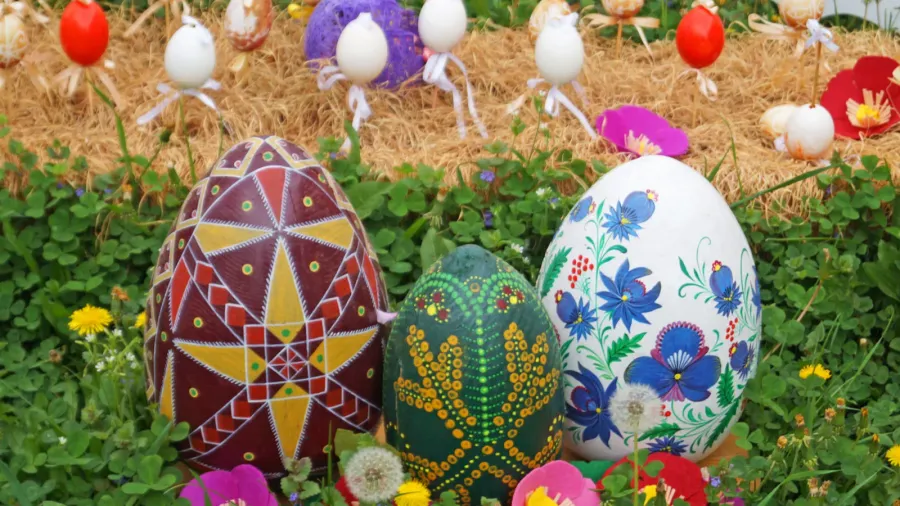 decorative easter eggs made of ribbons threads and fabric at