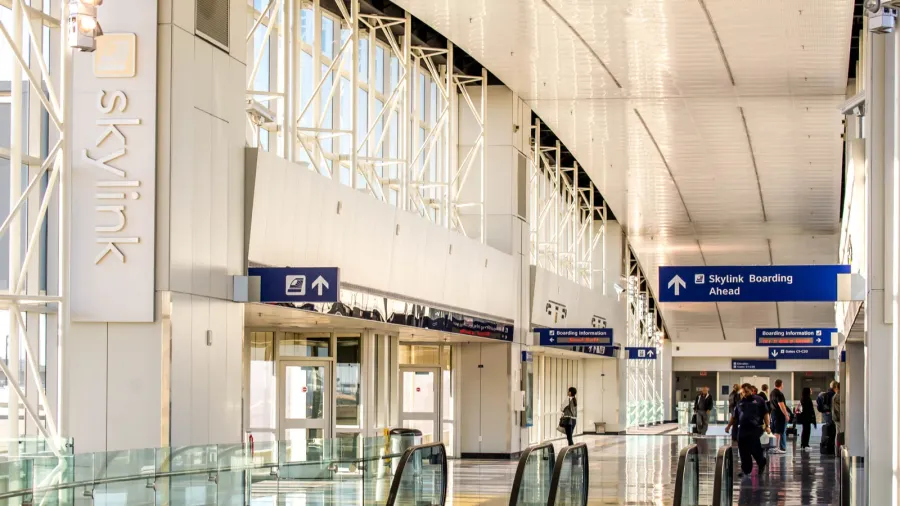 dfw airport  passengers in the skylink station