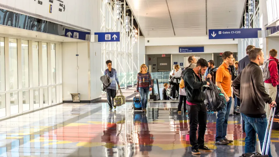 dfw airport  passengers in the skylink station