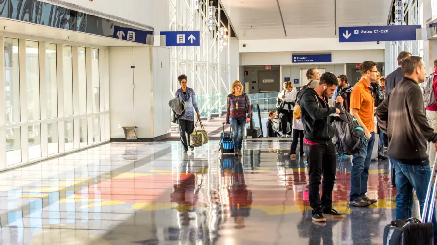 dfw airport  passengers in the skylink station