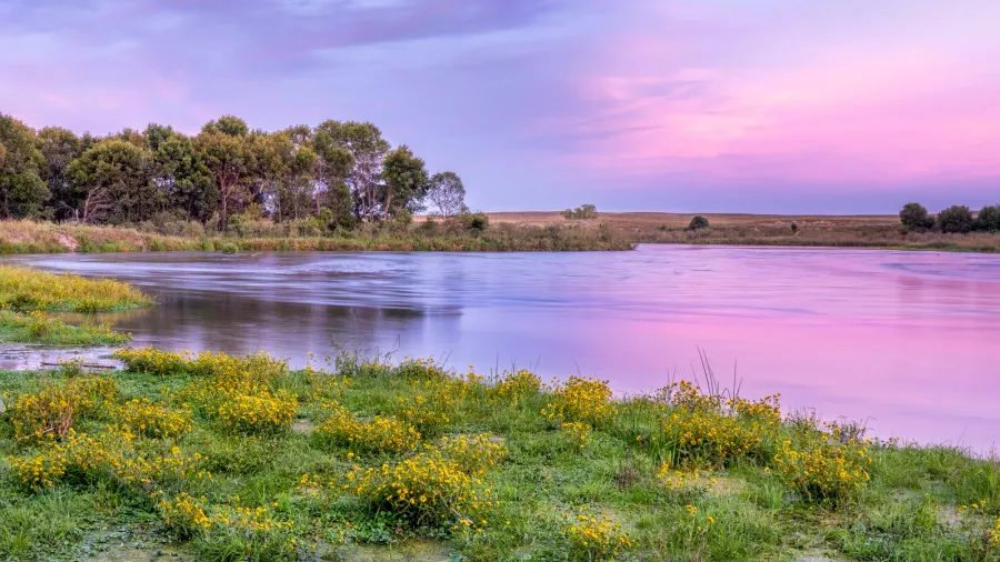dusk over dismal river in nebraska sandhills