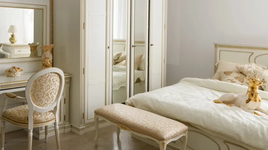elegant dressing table by bed in stylish room