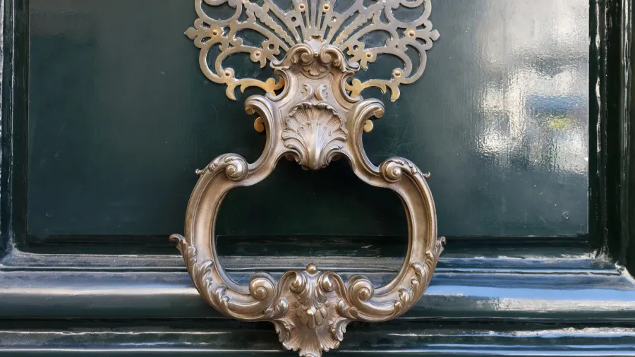 european vintage old metal wrought iron door knocker design detail