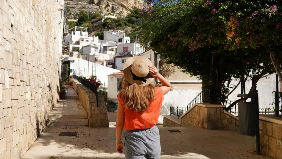 exploring alicante in spain young traveler woman walking in the