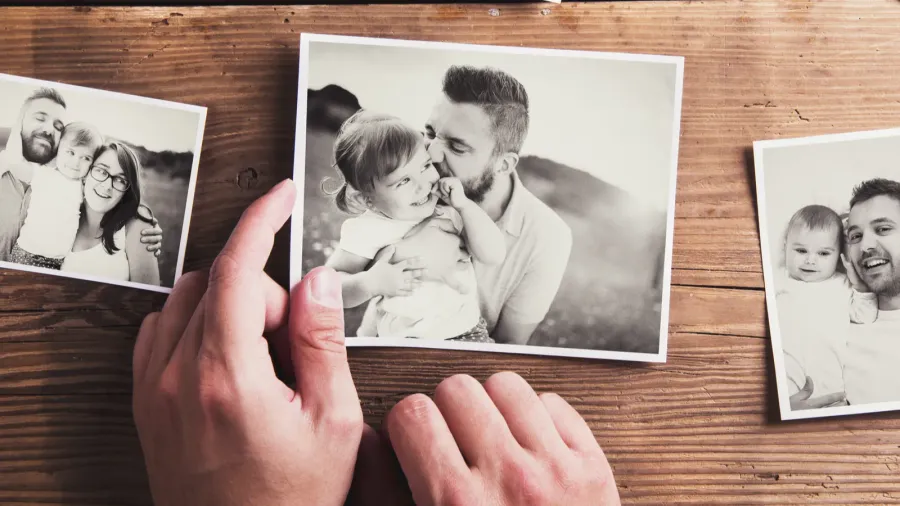 family photos in hands