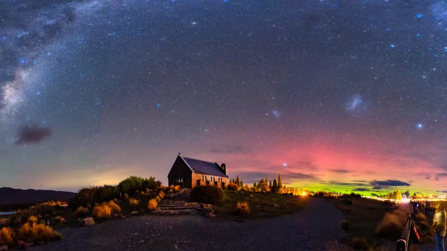 fantastic nightscape of milky way nebula aurora australis glowing over