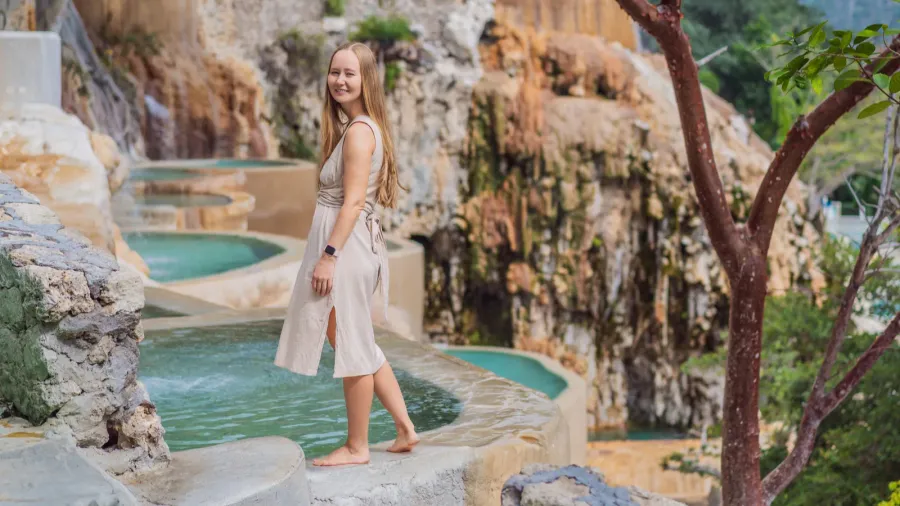 female tourist exploring grutas tolantongo in mexico enjoying natural hot