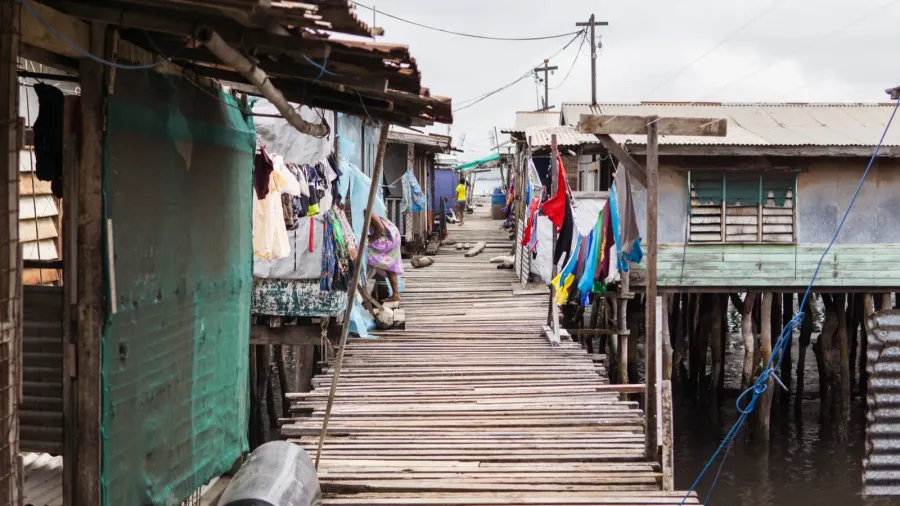 floating wooden village without recognizable people on the coast of