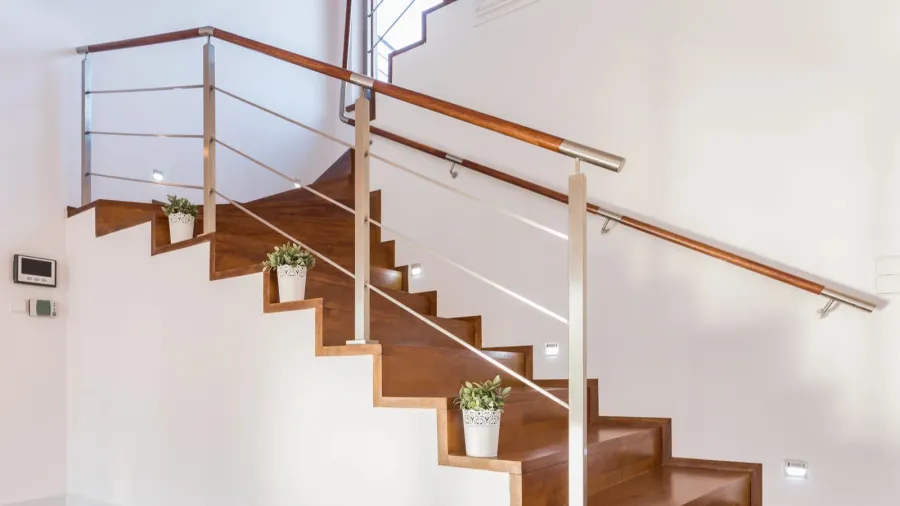 flowerpots situated on wooden stairs