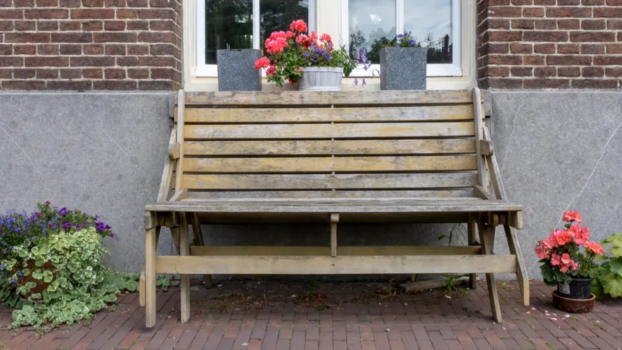 front view of a wooden bench in front of a