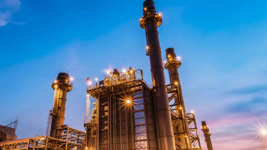 gas turbine electrical power plant at dusk with twilight sky