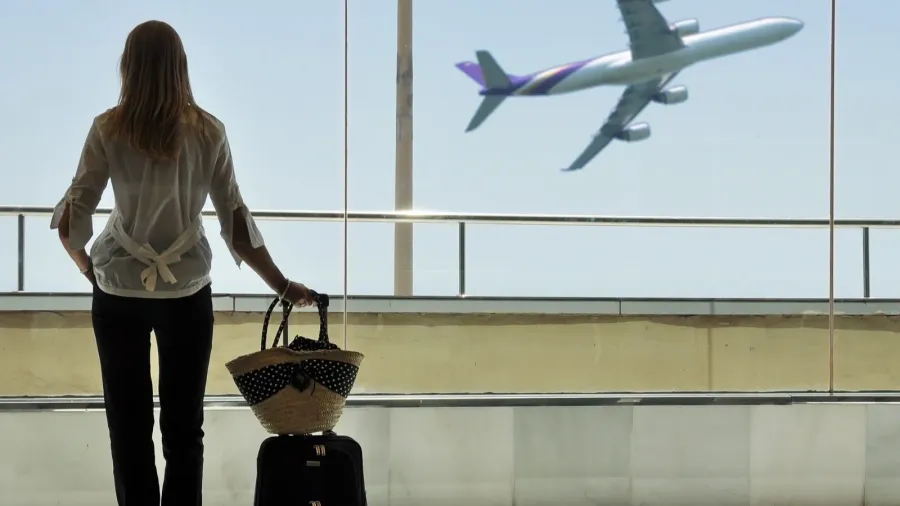 girl at the airport window