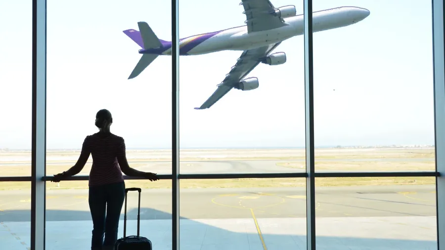 girl at the airport window