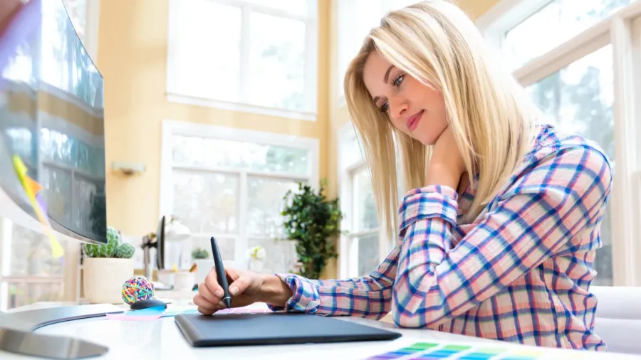 graphic designer using graphic tablet