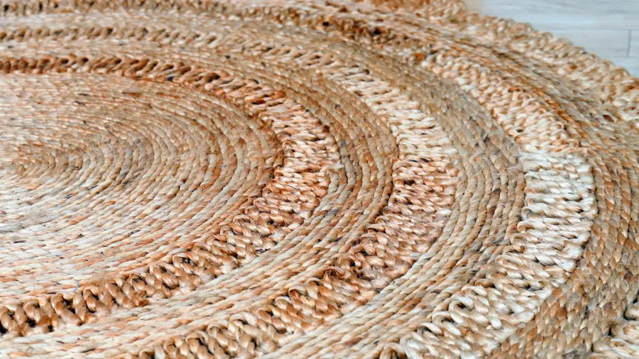 A handwoven round area rug.