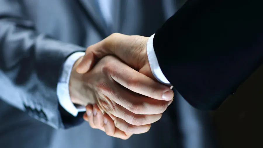 handshake  hand holding on black background