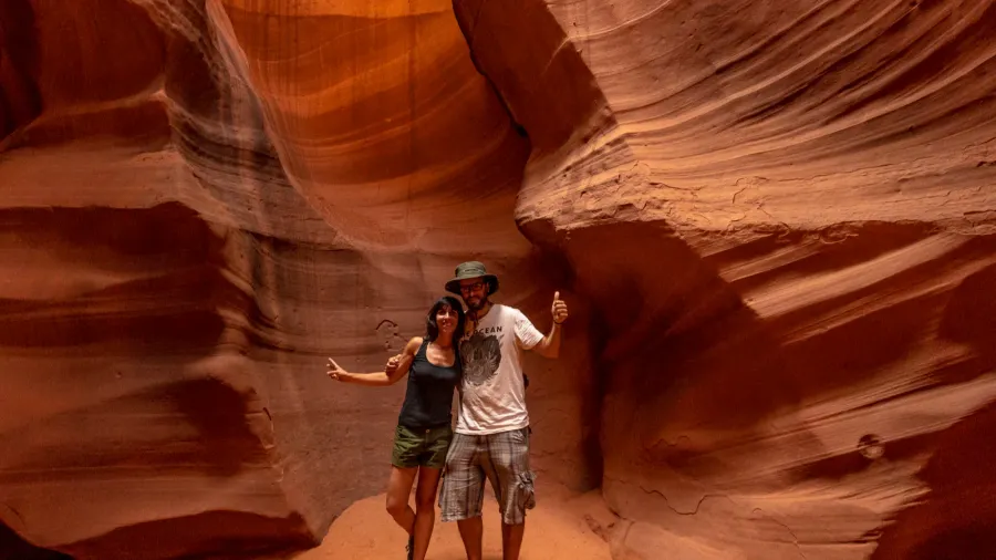 happy couple in cave in the upper antelope canyon arizona