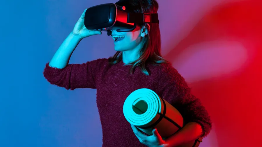 happy girl with vr glasses headset holding rolled yoga mat