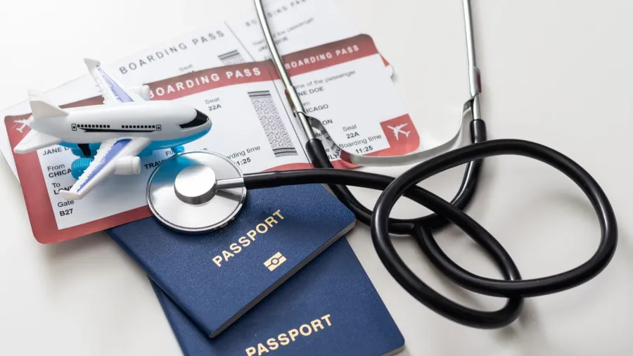 health insurance in travel concept medical care abroad stethoscope toy